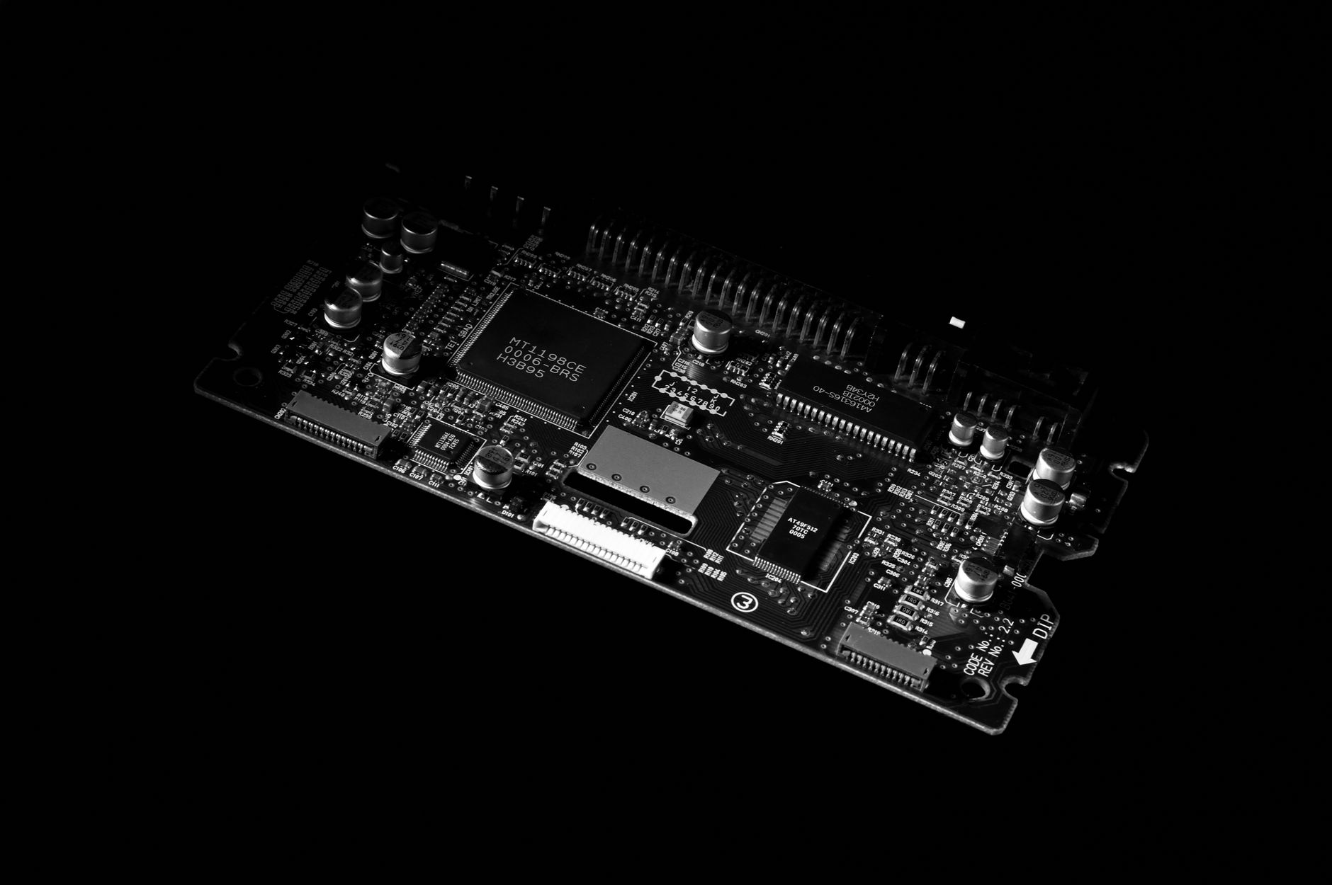 Detailed black and white image of a computer circuit board, showcasing technology components. — How to Choose a Reliable Free