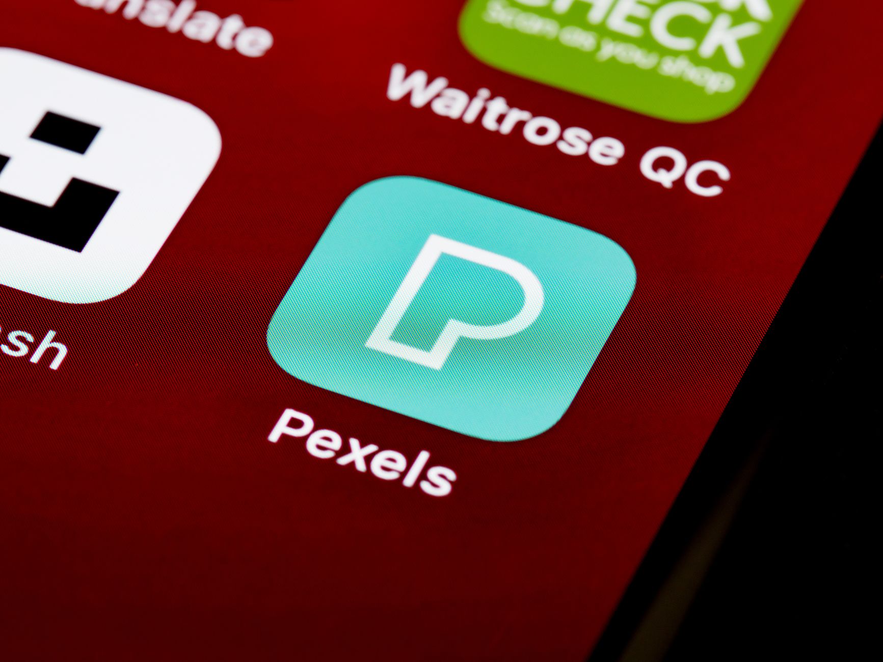 Close-up of various smartphone app icons displayed on a screen, showcasing digital technology and modern lifestyle. — Now Get