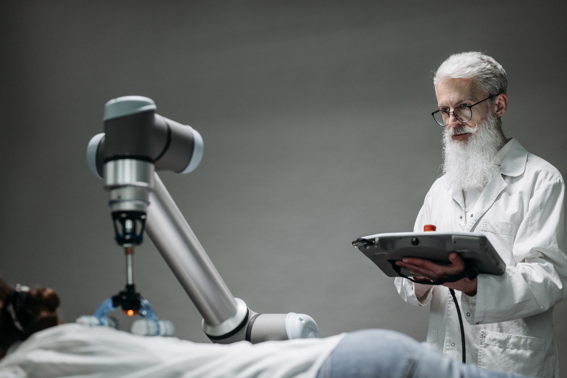 Senior scientist observing robot performing a task indoors. — Perfections of CSGO Boosting Now