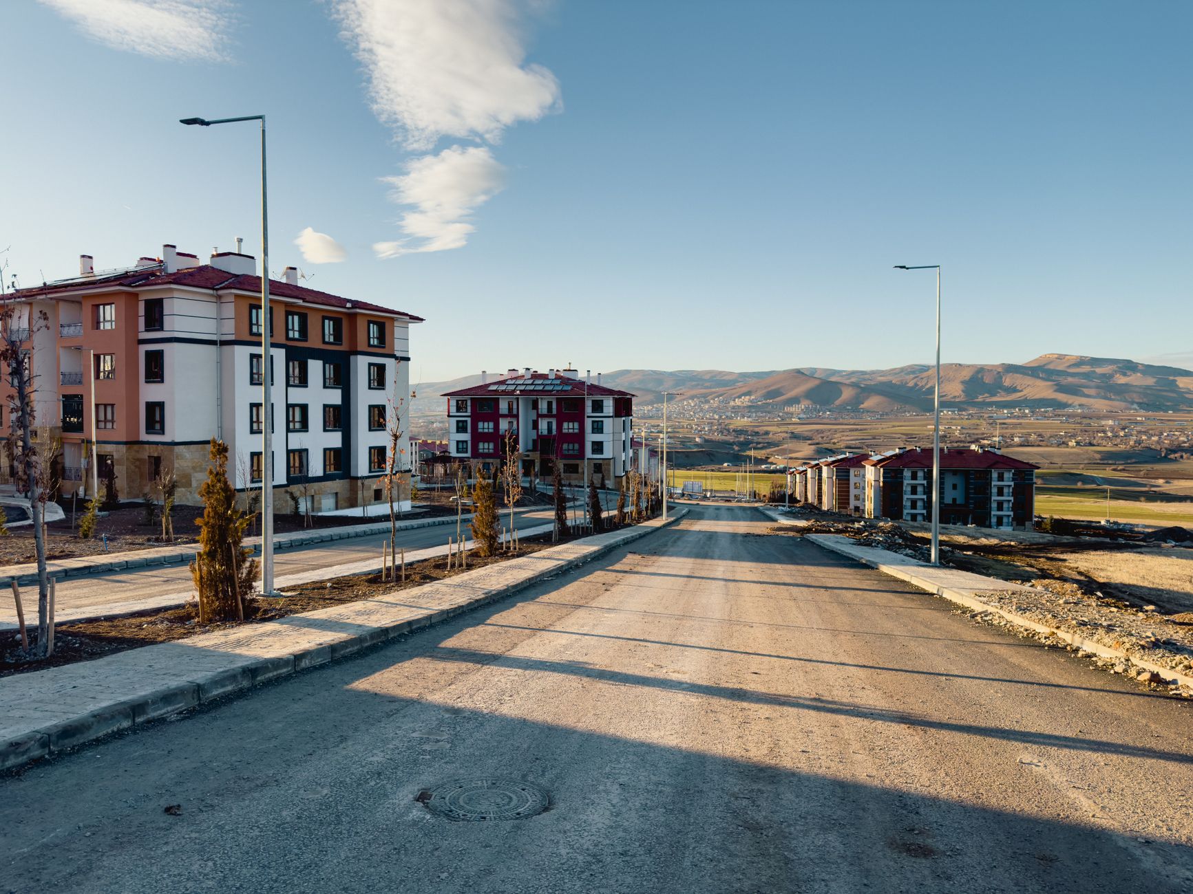 Quiet suburban street with modern apartments and a scenic view in Palu, Elazığ, Türkiye. — The Role of Social Media in Modern